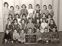 Miss Lorene Swanay's afternoon kindergarten class in California was seemingly a very happy group, with a few glum exceptions. I'm the befuddled lad holding the sign and flanked by the Tipton Twins. It's chilling to read the date on it; one month later the nation suffered a tragedy we were too young to understand. View full size.
(ShorpyBlog, Member Gallery)
