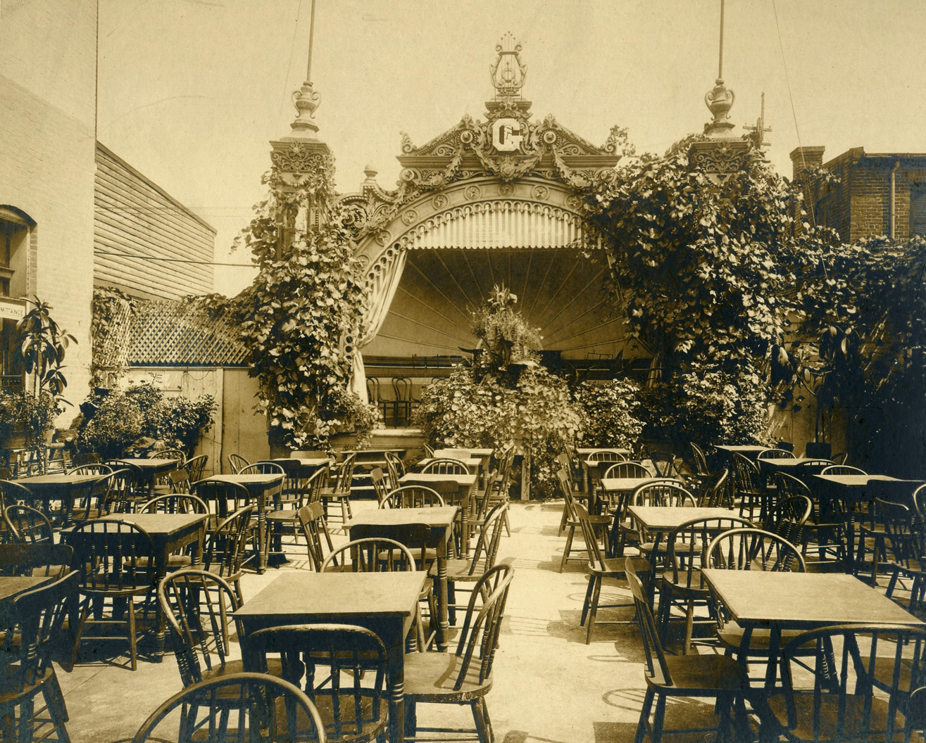 Rooftop garden of Fred Geyer's beer garden after it was purchased from George Kozel. 1827 14th St. NW, Washington D.C. probably about 1904-1908. View full size.