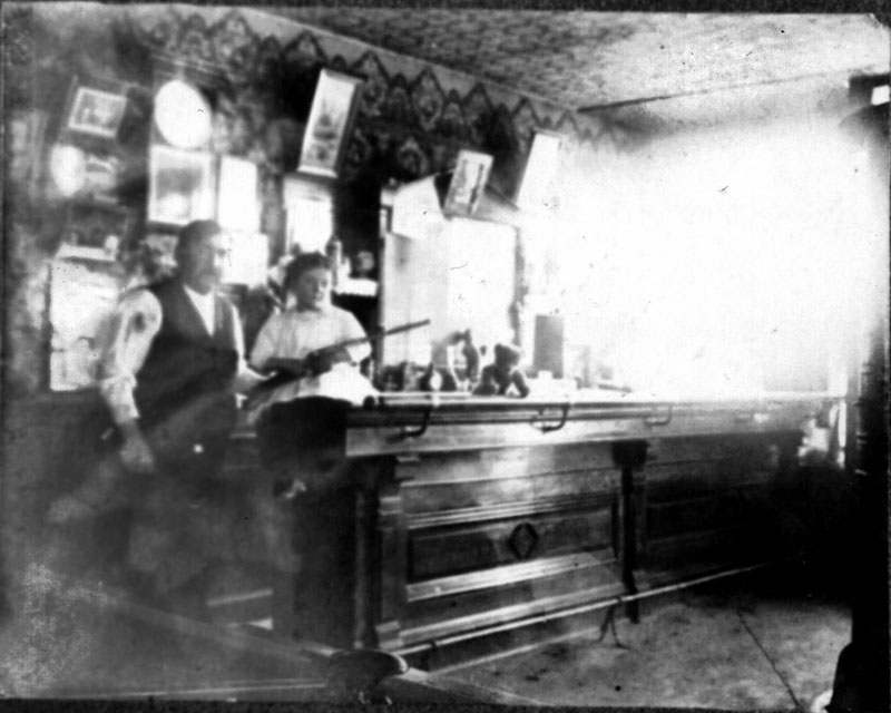 This is a picture of my great, great uncle Albert Kruspe (I think I have the greats right. He was my paternal great grandfather's brother) in the bar he owned called Kruspe's Saloon in Orland Park, IL. The bar is still there and is now known as Paddy D's. 
This picture is from the 1890's. It features my great, great uncle along with his young daughter, holding a shotgun in her lap with her teddy bear sitting on the bar. This is an awesome picture that I got from the Orland Park Historical Society. When I contacted them, the guy that received my email said he was just putting this picture up on his computer . . . the Kruspe's must have been calling me. View full size.
