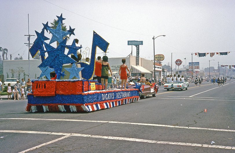 Wilshire gas 28-9/10¢ a gallon, Blue Chip Stamps, Green Stamps, go-go girls on a float, what more could you ask for? Taken by my dad in La Habra, California, August, 1965. View full size.
