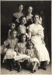 Les soeurs Gaudreau de Stanbridge East, Quebec, 1912. Unknown photographer. View full size.
Jolies demoiselles!Une belle famille. Merci!  Beautiful young ladies, thank you!
What a Bunch!Got to be the most beautiful group of sisters I've ever seen. Gorgeous pair of eyes times eight.
Is that fatalism?My modern eyes are at a loss to interpret the expressions  on those faces.  Some sort of resignation?  Fatalism?  What?  Must be a deliberately chosen affection, even the little one is doing it.  Discomforting somehow.
But a great photograph, as well crafted as an oil painting.
And yes, how beautiful!  How I miss real dresses.
LovelyStunningly beautiful girls!
Great pic.Excellent work by the photographer to capture all of them at that instant.
Help finding source of photoPlease help me find the source of the above photo labeled Les soeurs Gaudreau de Stanbridge East, QC, 1912
I am wanting to do some geneology research.
Thank you
[To contact the submitter, click on the member name (Sonolisto) above the photo, then the Contact tab on their profile page. -tterrace]
[Also, it's "genealogy." - Dave]
35 Years LaterLes soeurs Gaudreau, 35 years later, Stanbridge East QC.
(ShorpyBlog, Member Gallery)