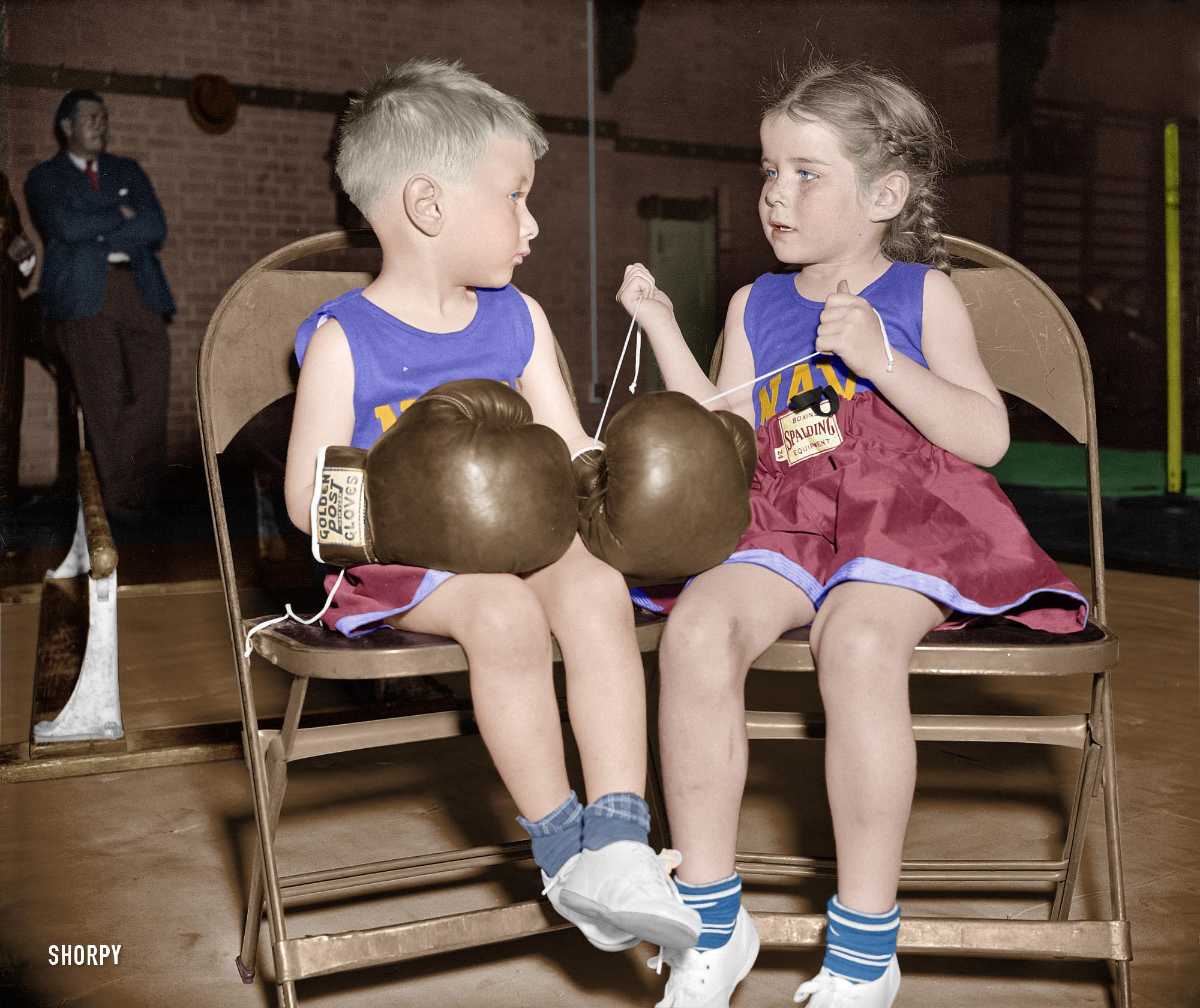 Colorized version of this Shorpy photo. Looks like this little guy may be having second thoughts.