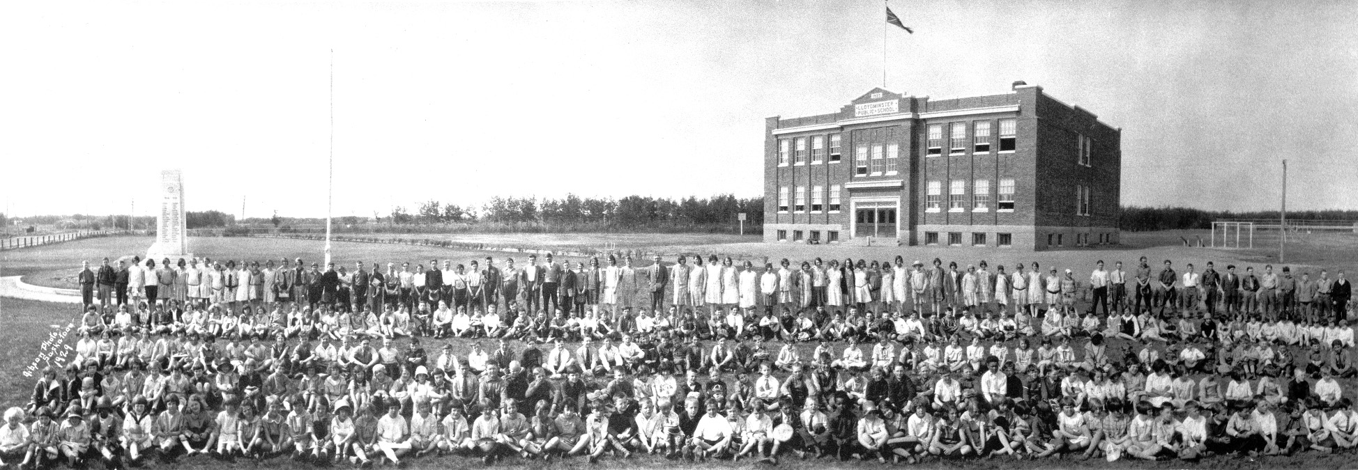 Photo was taken at Lloydminster, Saskatchewan Public School in 1929, probably just before summer holidays. Maza Bexson (Becky) at six years is front row, 8th from left in white. View full size.