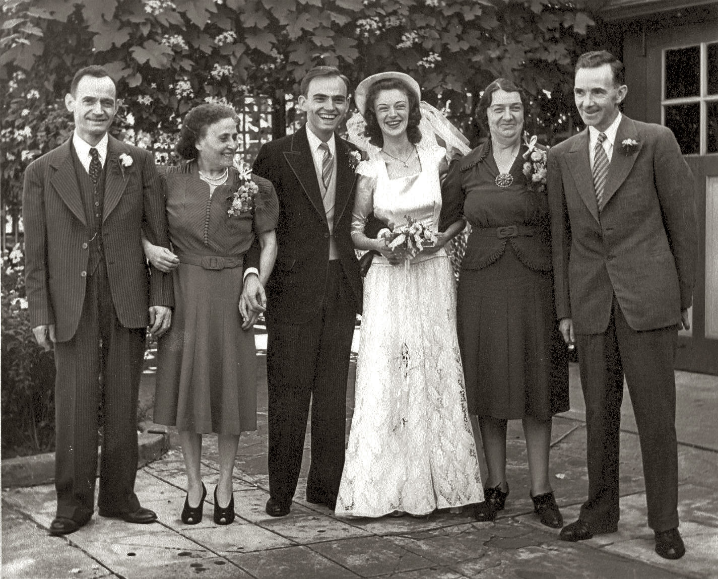 My wife's parents: Louis Donato (son of Italian immigrants) and Nancy Lowry (daughter of Irish-immigrant father and American-born Irish mother) on their wedding day. On left: Illuminato and Santina Donato; on right: Philomena and Michael Lowry. September 20, 1941, in New York City.