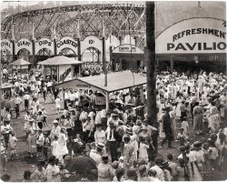 Luna Park in Charleston, West Virginia, around 1915.  There were many Luna Parks in the U.S., the most famous at Coney Island in New York. This photo is believed to have been taken on the Fourth of July, due to the dress of some of the people (like Uncle Sam).  The Park, like many Luna Parks of the day burned down, and was never replaced.  The strange streets that are still in use to this very day in Charleston where Luna park stood, are a direct reflection of the walkways there. Today, hundreds of homes sit in its place. Original photo by Cochrane. View full size.
(ShorpyBlog, Member Gallery)