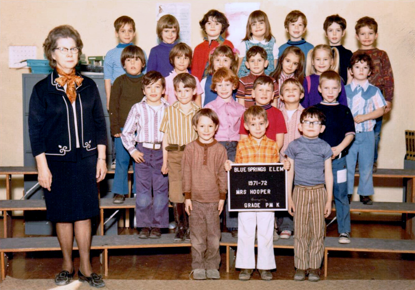 That's me up front, holding the sign and rocking those white pants. Blue Springs, Missouri 1971. View full size.