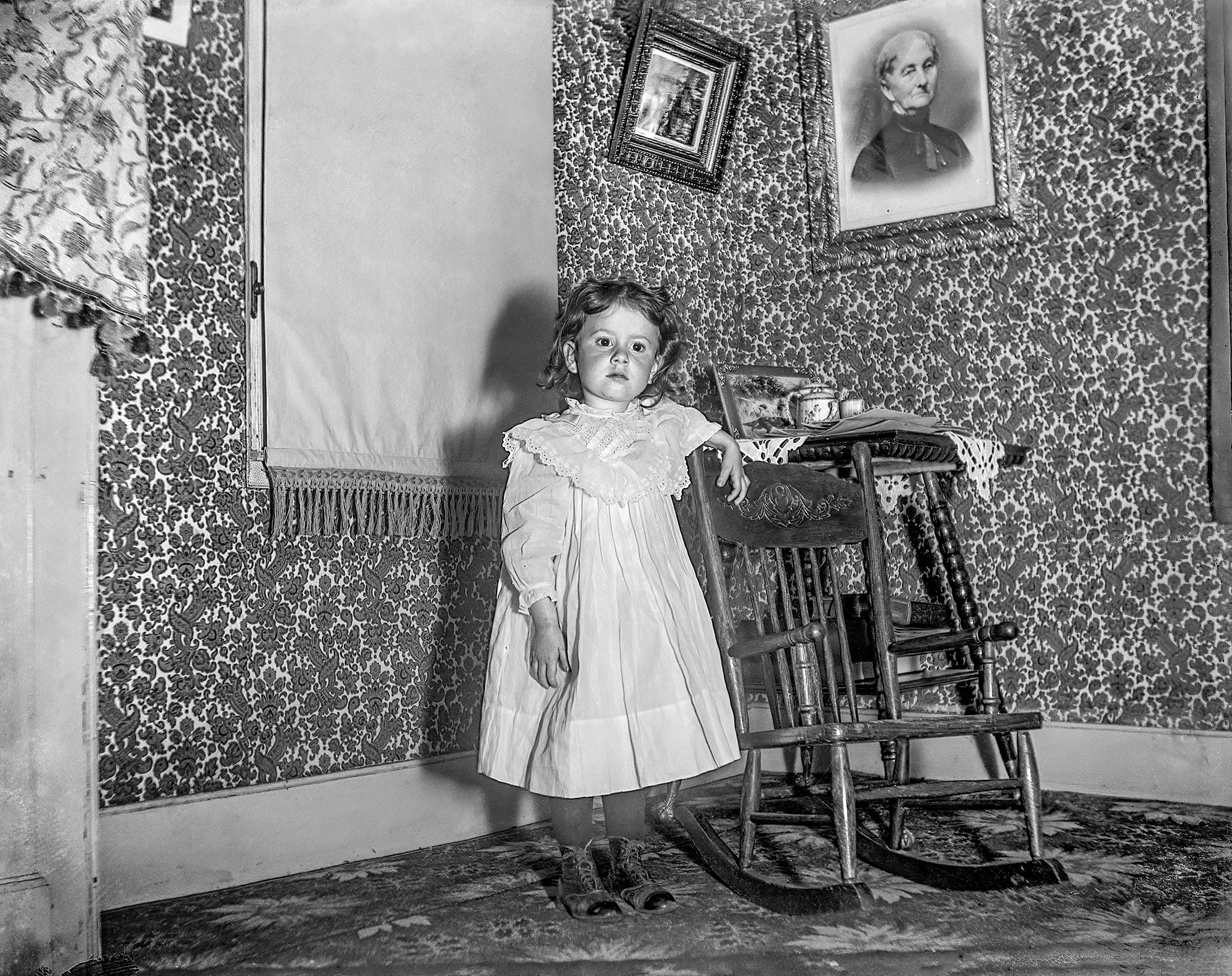 "Marion standing by rocker in parlor" is what's written on the envelope I found this glass negative in. It's from Glenmont, New York, circa 1910. View full size.