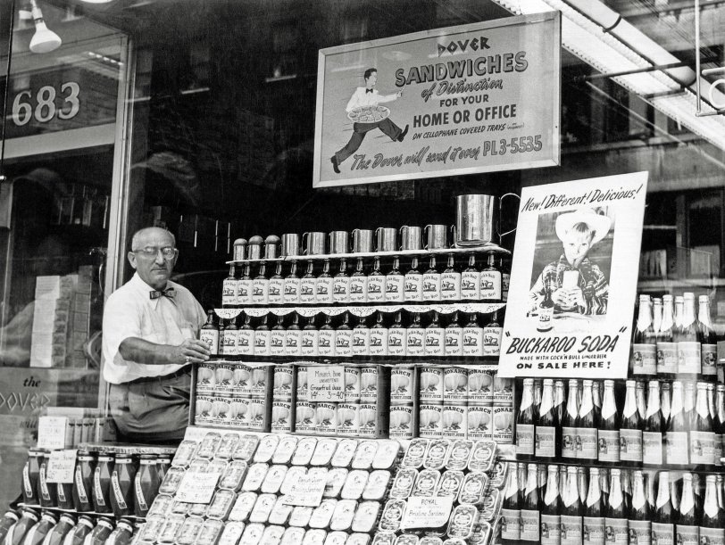 No information on this photo I just purchased on eBay. A grocery or deli somewhere with a big display of Cock 'n Bull Ginger Beer and Buckaroo Soda. View full size.
