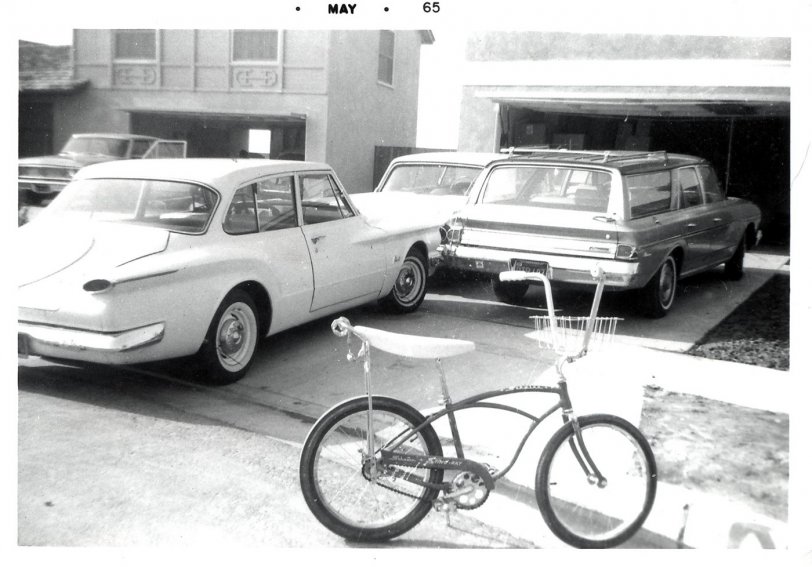 This isn't a picture of my Bicycle, my house or my cars, but it might just as well be. I remember my childhood in 65 looking a great deal like this. This 3x4 black and white print is from a lot of photos found at auction. View full size.
