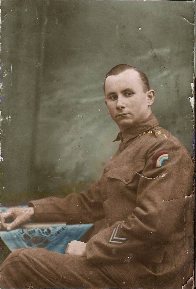 Photo was probably made in or about November 1918. The insignia patch of the 167th Inf., "Rainbow Division," was originally a full half-arch, but was later reduced to the "quarter arch" shown here, to memorialize the half of the division's soldiers who were killed or wounded. Albert W. May died in Oct 1975 at age 83. View full size.
