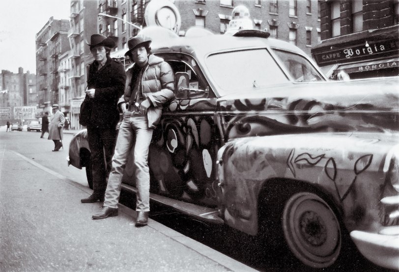 I had been hanging out at the folk clubs in Greenwich Village many years before this was taken. In the photograph I was fresh in from Santa Cruz, CA, and had my "Psychedelic" '47 Ambulance parked on MacDougal Street about in front of the long gone but not forgotten Gaslight Cafe. Note the upper cockpit and windscreens where you could sit high (no pun) and watch the world go by. The rotating radar antenna is fully operational. Bought at a city auction in Santa Cruz. I was three miles away from Ken Kesey's place in Soquel -- and now you know where the color scheme came from. View full size.
