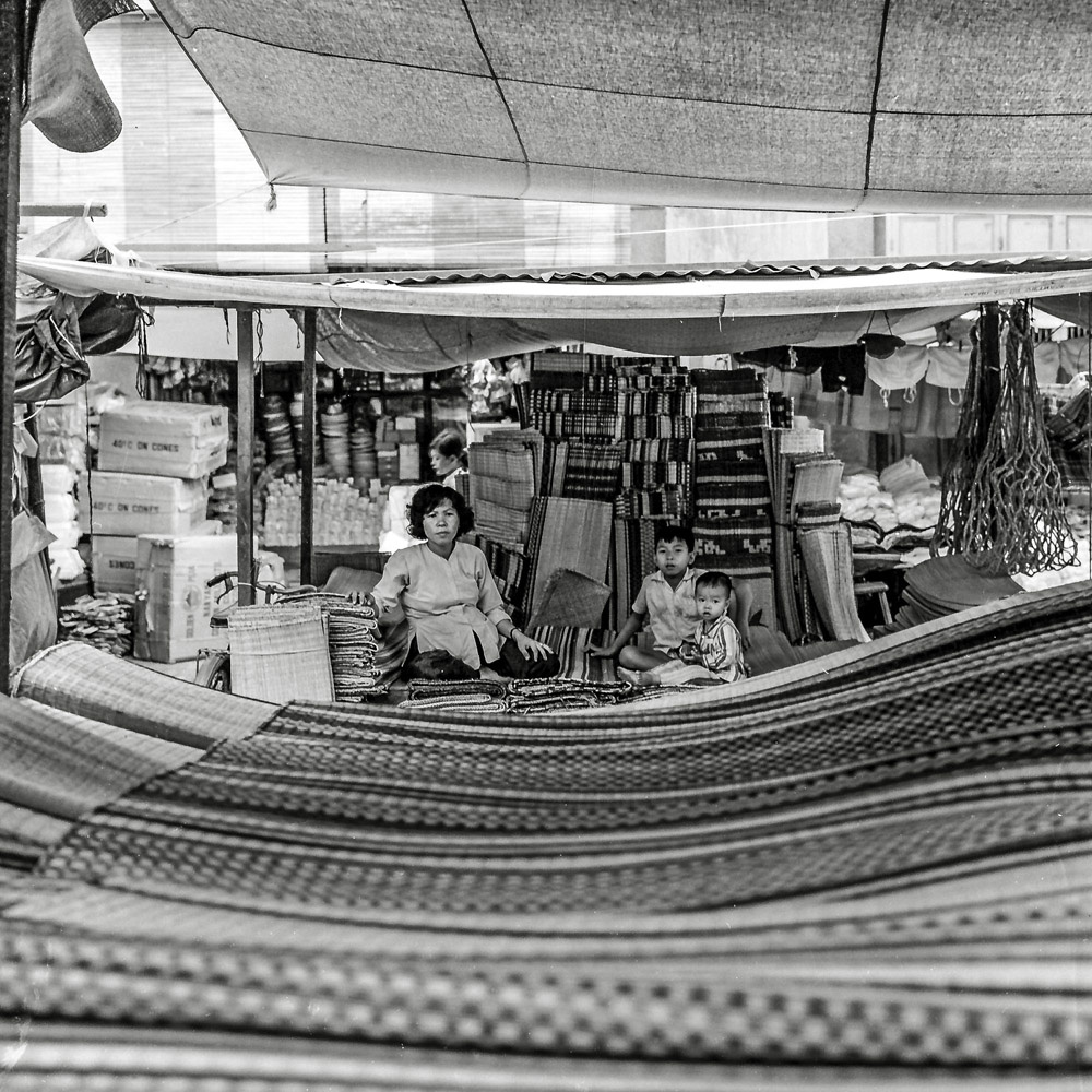 Mecong, South Vietnam. They sold to the local people. After we blew that commerce to kingdom-come this area is now fully developed with modern factories producing goods for us. View full size.