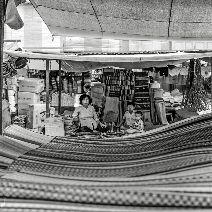 Mecong, South Vietnam. They sold to the local people. After we blew that commerce to kingdom-come this area is now fully developed with modern factories producing goods for us. View full size.

