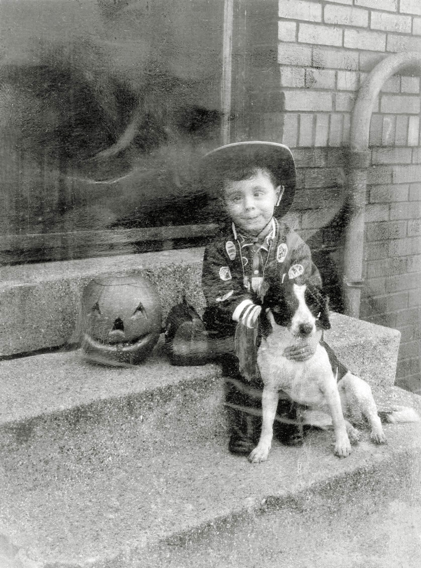 A rough Polaroid surviving from 1964, me and my best dog Mitzi, getting ready for Halloween. Taken at the rear of 450 East Walnut Street, Chatham Arch neighborhood of downtown Indianapolis.