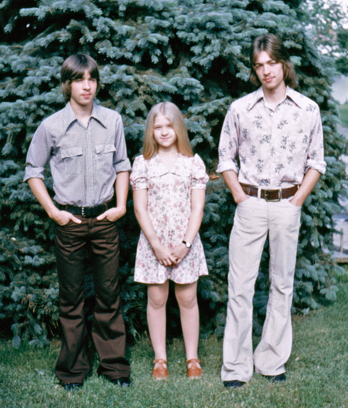 My siblings, about 1975. Picture taken in our front yard in Ohio. View full size.
