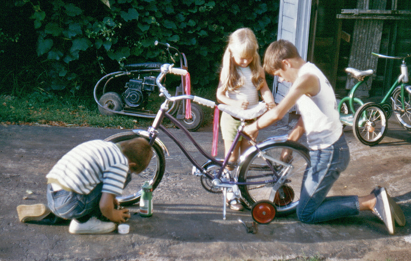Polishing the chrome. Mid-60s, Ohio. View full size.