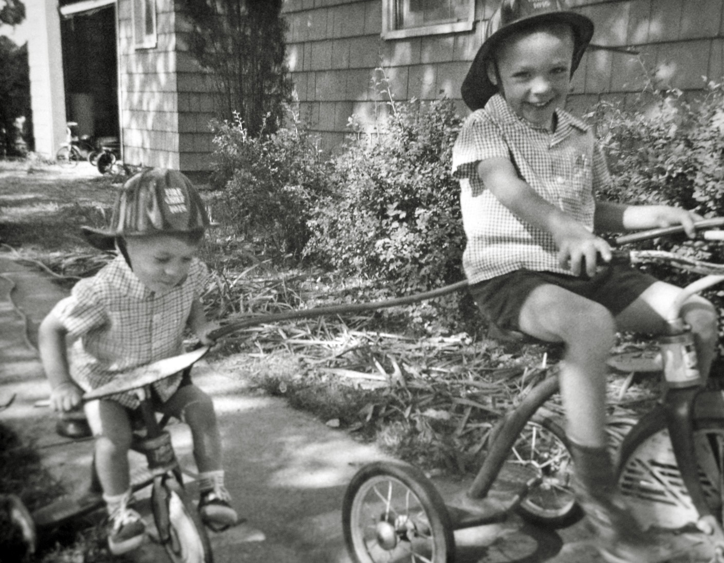 My older brother and me going on a fire run. 1962, Akron Ohio. View full size.
