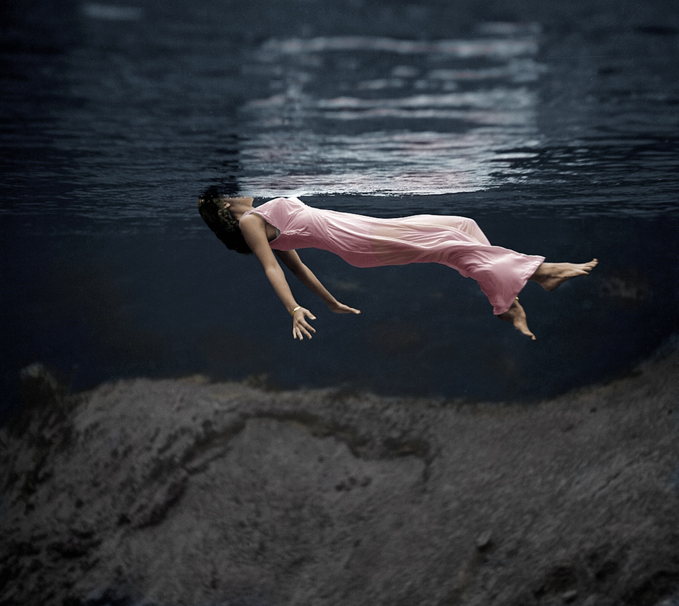 A colorized version of "Lady in the Water." The image was shot by fashion photographer Toni Frissell and was published in Harper's Bazaar in December 1947. View full size.