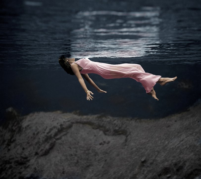 A colorized version of "Lady in the Water." The image was shot by fashion photographer Toni Frissell and was published in Harper's Bazaar in December 1947. View full size.
