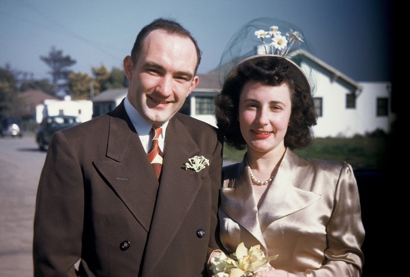 My parents on their wedding day -- Saturday, February 14th 1948 in front of my Uncle Walt's house in San Mateo, Ca. My dad (24) was still in the Navy and was a survivor of combat in the Pacific and the sinking of the USS Little (DD803) off the coast of Okinawa by kamikazes 3 years previous. A native of Akron Ohio, he passed away in '66. Mom (23) is a native San Franciscan who's still alive and kicking. She still laughs about that hat. View full size.
