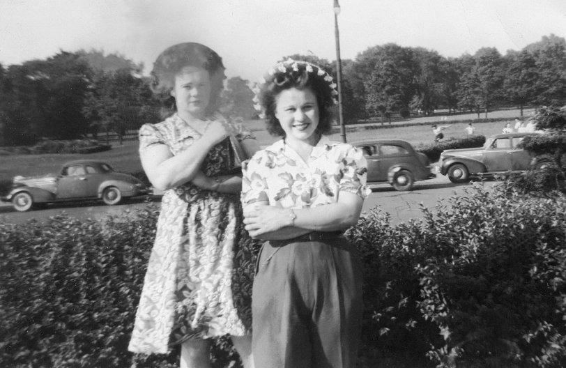 My Mother and her sister, Christine.
Year: I’m guessing 1944, although the Shorpsters could probably date the photo by the cars in the background. Location: Belle Isle (Detroit) MI.
Image courtesy of the Box of Curly Photos from my parents. View full size.

