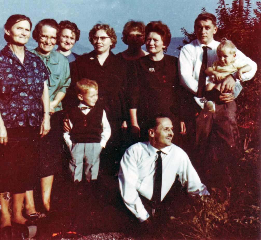 My family 1963, grandmother, grand aunt, aunts uncles, my mother, my brother and my father with me.