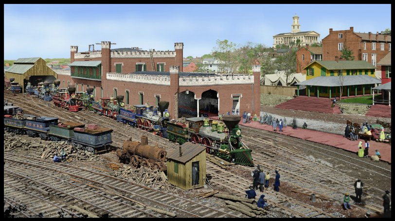 Colorized version of two photos by George Barnard of the U S Military Railroad depot at Nashville, TN in 1864. Mr. Barnard shot two photos that day from the same position with the second one more to the right of the first view. I combined the two views into one image which gives a wider view of the scene. Then, I colorized it which took about 92 hours of work. The locomotive colors are educated guesses but do represent the colorful railroad equipment of that time. View full size.
