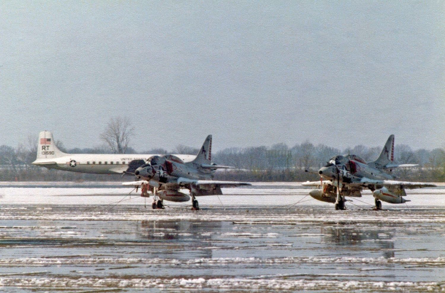 US Navy Sky Hawks on the tarmac at NAS Millington TN winter of 1977. View full size.