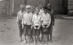 A group of children posing for a photo before being outfitted with new shoes and dinner from the Neighborhood House social service agency. The kids lived in the slums at Cinder Point between the Railroad and Illinois River, at the foot of Sanger Street, nearby the Flatboat City locale, Peoria, Illinois, circa 1933-1937.
The Neighborhood House Association, 1020 S. Matthew, Peoria IL, established in 1896, is dedicated to providing a Safe Haven with comprehensive services that meet the social, emotional and material needs of individuals and families from infancy to the elderly.
(ShorpyBlog, Member Gallery)