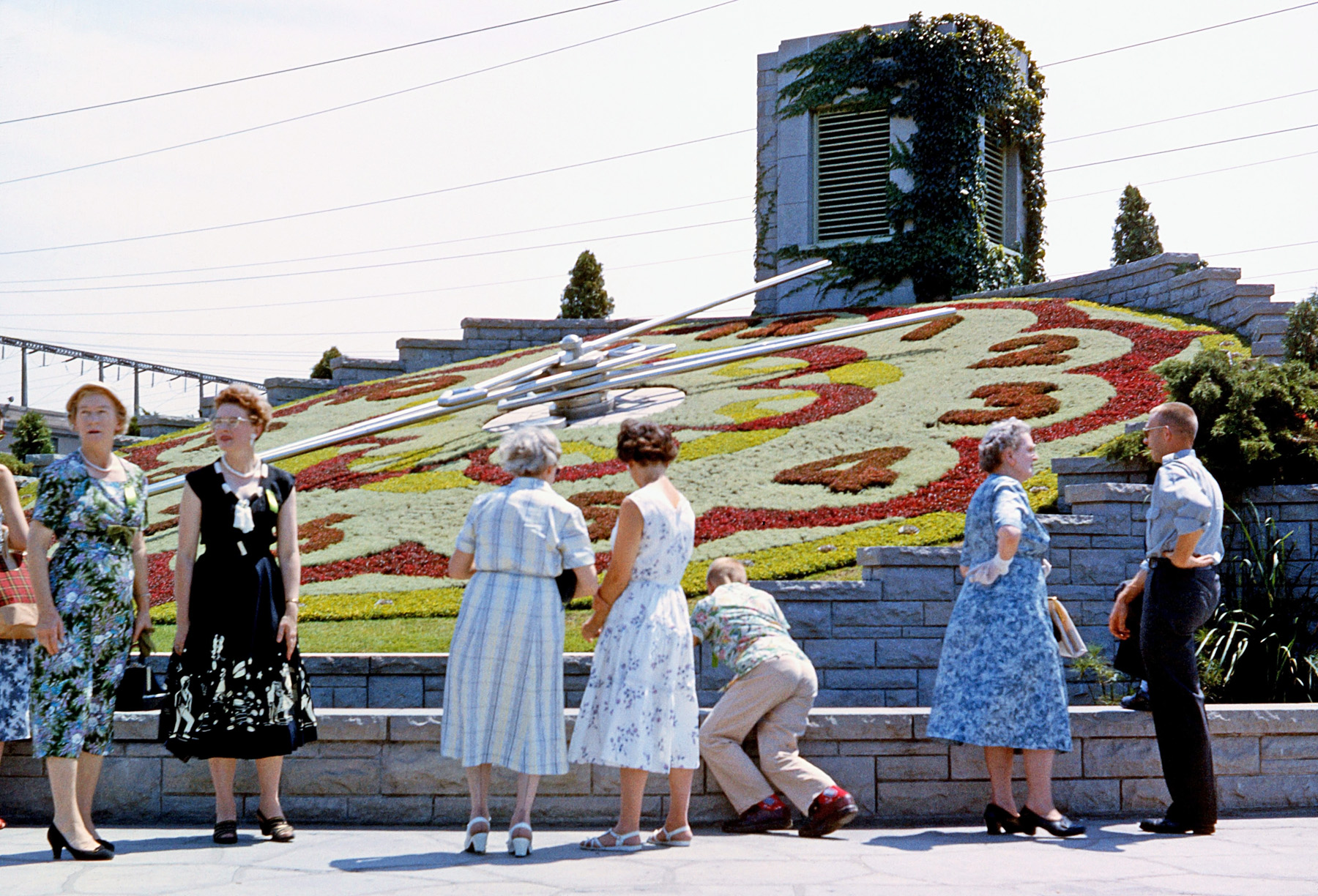 Here's another shot my Dad took in 1958, at the Niagara Parks Commission's Floral Clock, by the Adam Beck hydroelectric generating station on the Canadian side of the Niagara Gorge, a few miles downriver from The Falls. Directly across from here is the massive Robert Moses hydro plant on the U.S. side. Fashions sure have changed in 55 years. View full size.