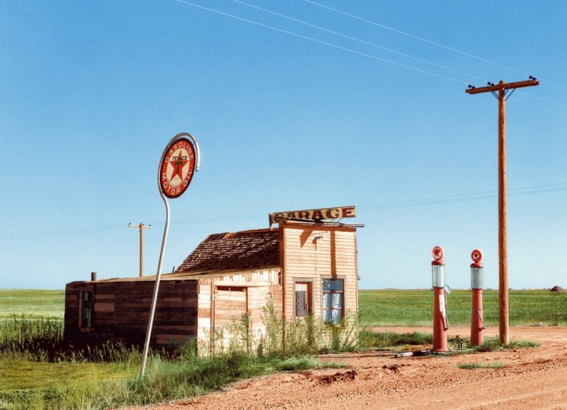 I colorized this Shorpy photo of the abandoned filling station in North Dakota, taken in 1937. View full size.
