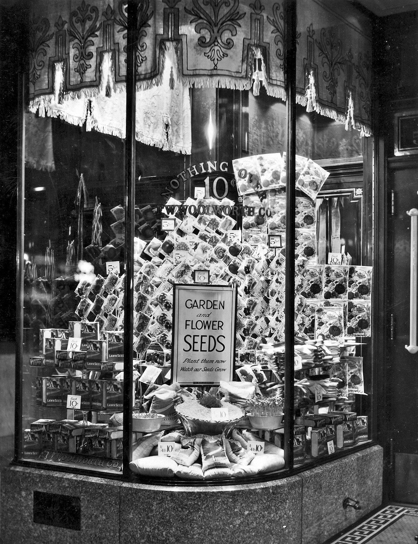 A window display from an F.W. Woolworth store, circa 1929.  My great-uncle managed numerous ones across northwestern Ohio during the 1920s and 30s.  This one is likely to be Findlay Ohio. View full size.