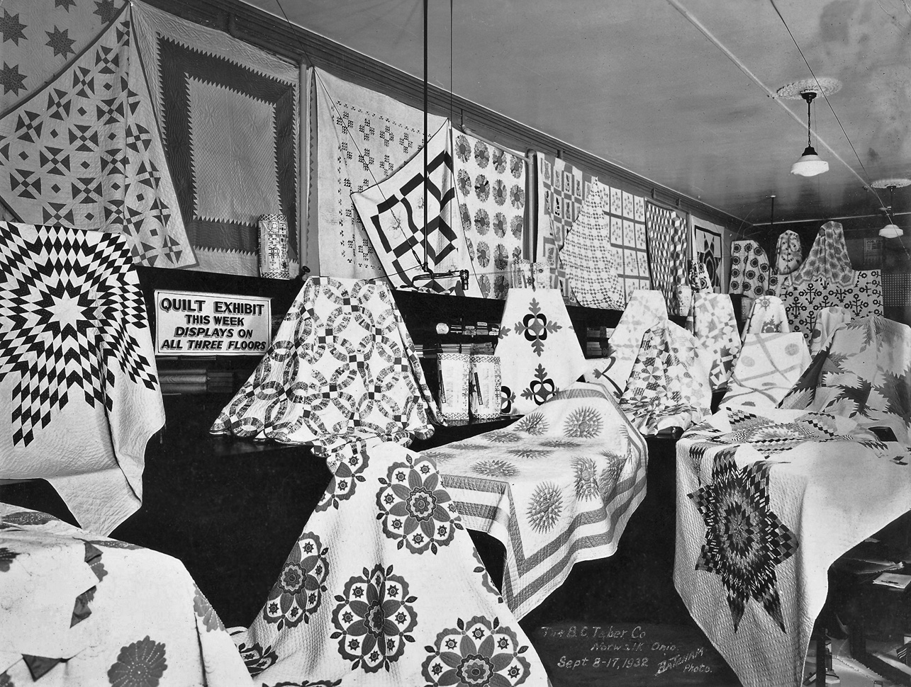 My grandfather managed the B.C. Taber department store in Norwalk, Ohio during the Depression. This is one of his displays, showing a sale on quilts from September 8th-17th, 1932. View full size.