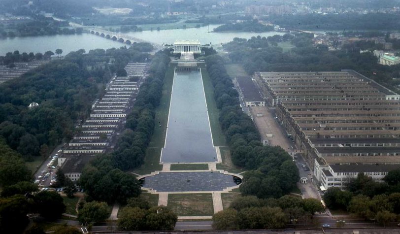 A view of the reflecting pool flanked by temporary buildings. Shot from the Washington Monument, September, 1962. View full size.
