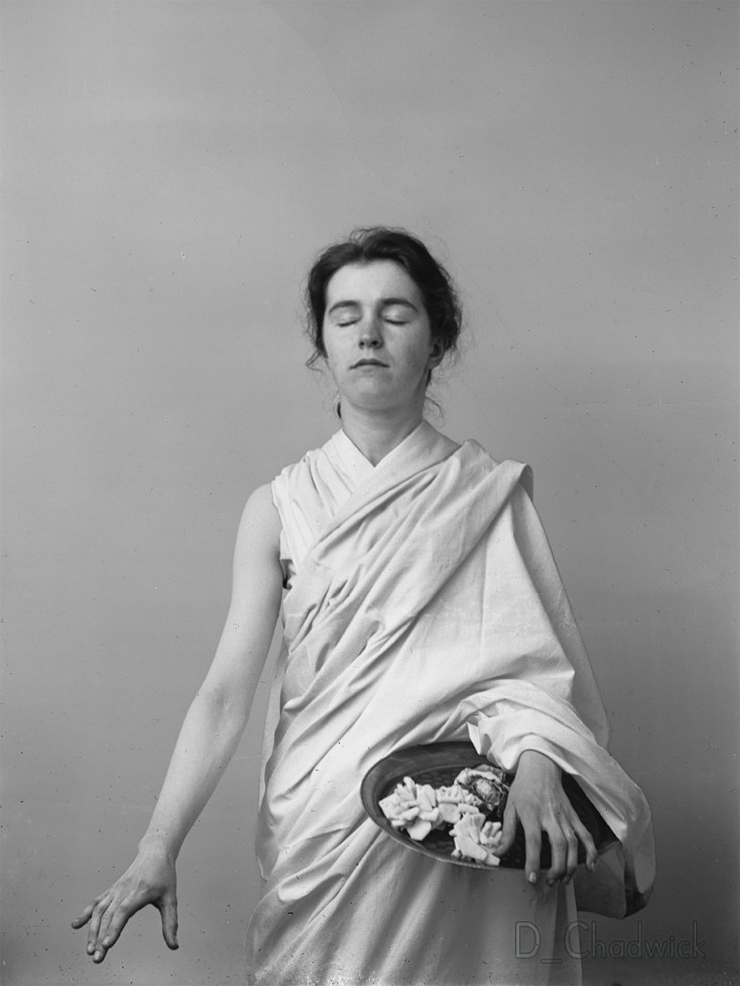 The original sleeve is labeled “Nydia, flashlight, June 2, 1892” My best guess is that she’s posing a Nydia the blind girl from “The Last Days of Pompeii”.  She was either a member or a friend of a prominent family from Thomaston, Maine.   Scanned from the original 5x7 inch glass negative. View full size.
