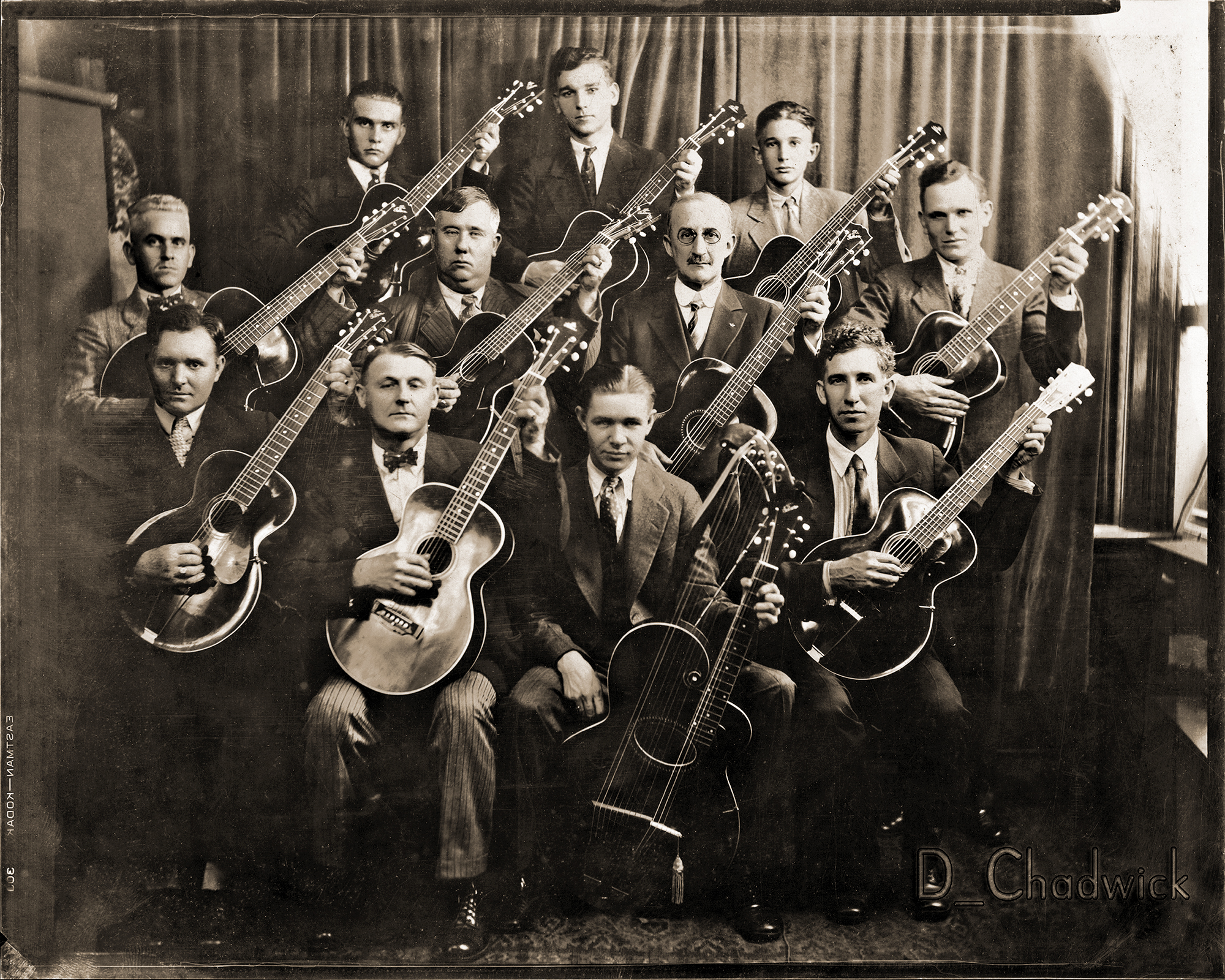 With the exception of the Gibson Harp Guitar they’re all Gibson L series acoustic guitars with “The Gibson” logo either at an angle or straight across the headstock. It's interesting that they're all posed playing an open D chord.  The original mat is stamped “New York Studio, Huntington W.Va”.  Scanned from the original 8x10 print. View full size.