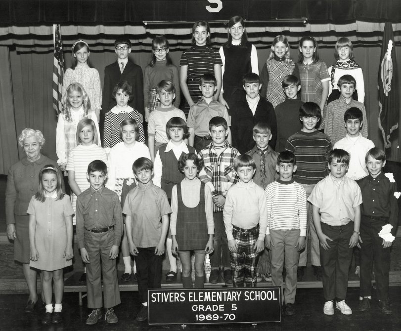 Louisville, Kentucky, 1969. O.J. Stivers Elementary on Westport Road, AKA "The Cardboard Penitentiary." I've got those great plaid pants on, front row, to the right of the school sign. I'm not pleased to be there. View full size.
[Judging by your other pictures, you're the fourth from right, next to Mr. Spock, correct? -tterrace]
