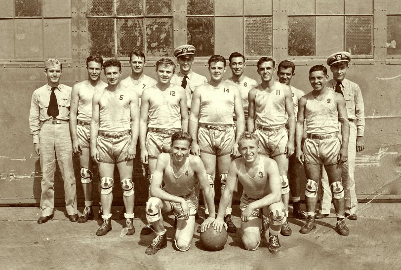 Pearl Harbor, 1944. Ford Field NAS basketball team. Number 11 is my father.  View full size.
