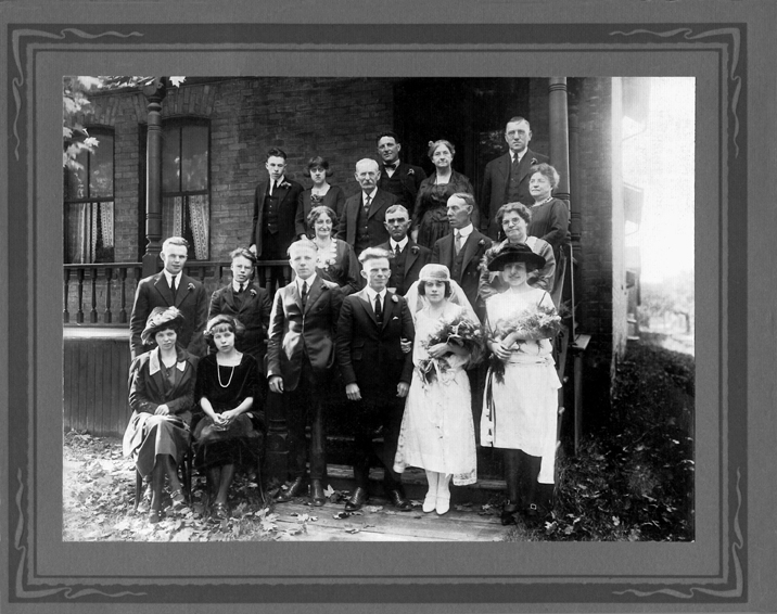 The bride and groom are my great-grandparents George and Cecilia Brown. Cecilia died when she was still very young from a kidney infection, when her son (my grandfather) was 3 years of age. I can't help but find my great-grandfather's tiny stature and ill-suited haircut comical.