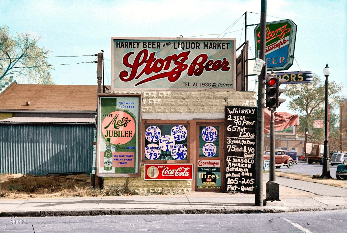 Taken off of Shorpy and colorized by me. November 1938. "Liquor store signs" in Omaha, Nebraska. 35mm nitrate negative by John Vachon. View full size.