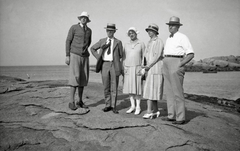 Back in the day, you dressed up for every occasion, whether going to church or on vacation. Looking at their surroundings, I am thinking Maine coast. From my negatives collection. View full size.
