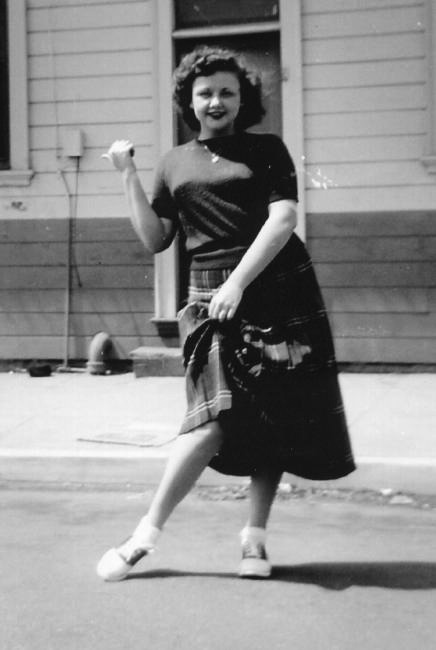 This is my mother in 1953, clowning around just outside of Tavy's Diner, which was once located on East 14th St. in Oakland, CA.  Tavy's was a popular spot for my mother and a group of her friends and they stopped in daily just after school was let out. 
