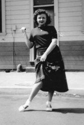 This is my mother in 1953, clowning around just outside of Tavy's Diner, which was once located on East 14th St. in Oakland, CA.  Tavy's was a popular spot for my mother and a group of her friends and they stopped in daily just after school was let out. 
(ShorpyBlog, Member Gallery)