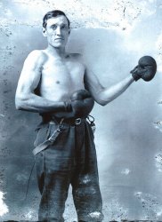 This is my great-grandfather, Gilbert Carroll Weimer, circa 1910. He lived in Garrett County, Maryland and my great aunt told me that boxing was a major pastime in those days. The men would make a boxing ring in town and gather to display their skills. View full size.
(ShorpyBlog, Member Gallery)