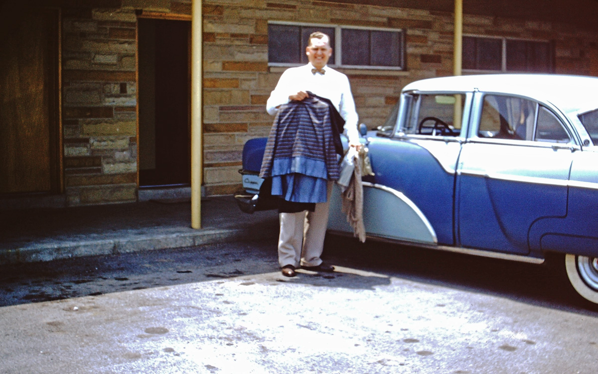 My grandfather's 1955 Packard Clipper.  Grandpa was a pastor and often traveled in the early days of his ministry.  After driving thousands of miles and saving money, he purchased his first (and only, that I know of) brand-new car.  This was taken on one of his road trips at a motel around 1956. View full size.