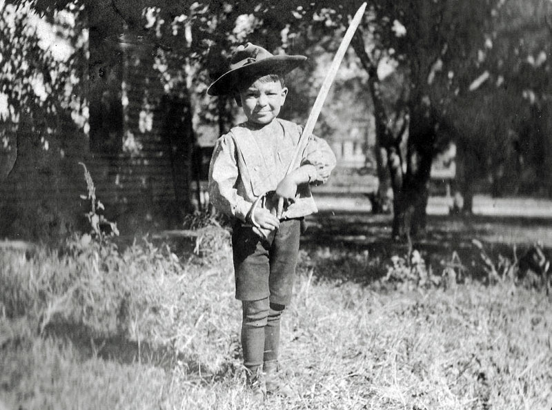 My dad, Rudolph Downing, in October, 1904 (age 4), in Wichita, Kansas. Pop is holding the Civil War sword of his grandfather, Benjamin H. Downing, a veteran of the 49th Pennsylvania Volunteers, and the campaign hat of his father, George D. Downing, of the Kansas National Guard.

Alas, both Pop and the sword are long gone. View full size.
