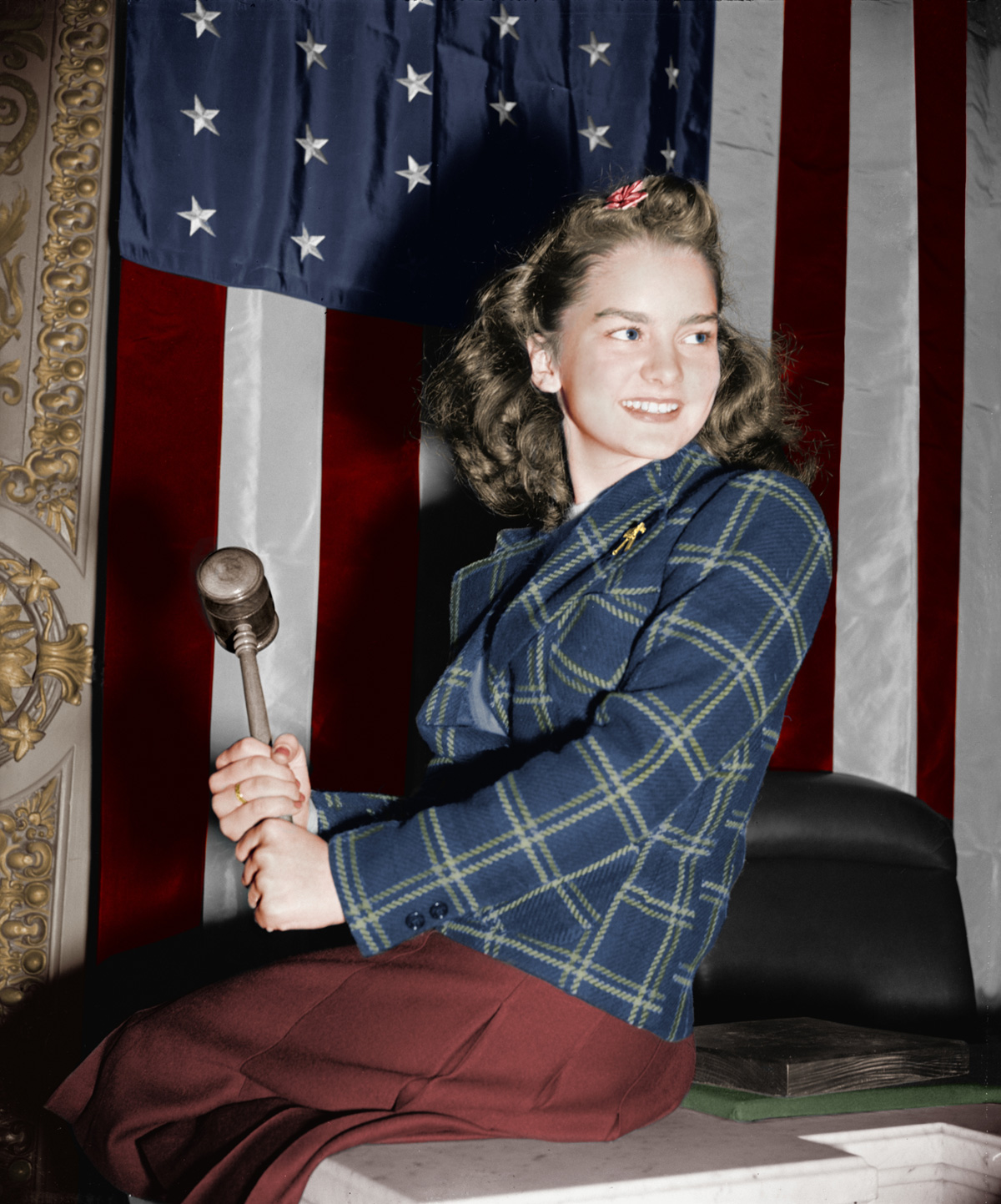 The first female page in the National House of Representatives, 1939. She is the daughter of Rep. Cox of Georgia. A colorized version of a photo from the Harris & Ewing Collection (Library of Congress).
