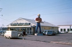 My Grandpa, Don Hobart, worked for Ace Hardware in the 1950s and 60s.  I am pretty sure this is from Elkhart, IN. View full size.
MovedApparently, this Paul Bunyan has been moved to Virginia as of September 2011.
http://www.roadsideamerica.com/tip/2578
Surprised nobody has axedWhere's his ax?  When I was a kid, a local lumber yard had a Paul Bunyan identical to that out front.  He held an ax, as this one obviously did at some point.  Our Bunyan moved out some time back also.  I've always wondered where such a thing ends up.
One nearbyThere's a Muffler Man just up the road from me in someones yard, along with a giant Chicken and a Statue of Liberty head.
It's been there a long time.
http://www.roadsideamerica.com/tip/5893
(ShorpyBlog, Member Gallery)