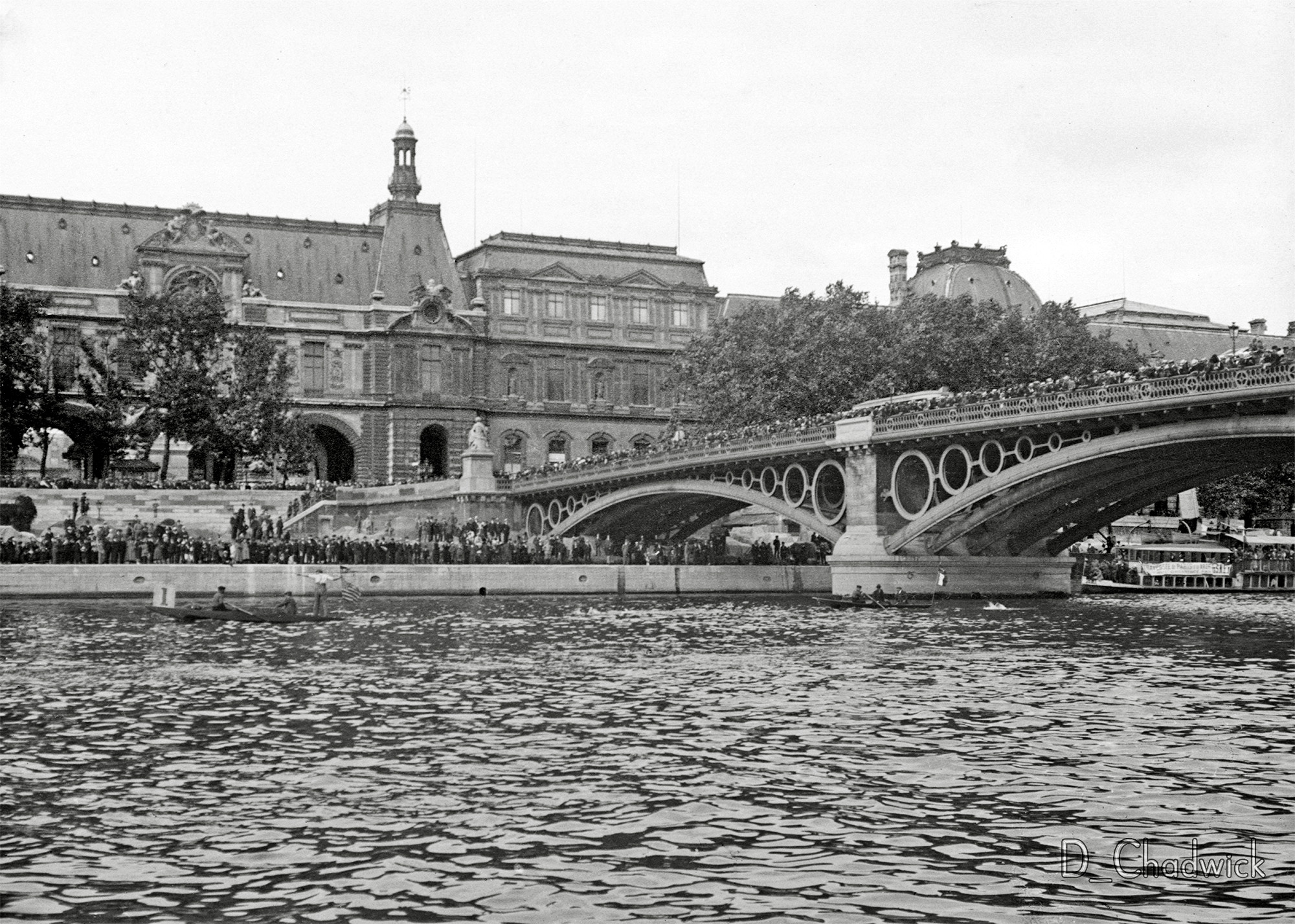 This is a photo of the 10km swim  river-race through Paris on the Seine.  It was held from 1905 to 1940.  “La Traversée de Paris” – the Paris open swim which in the early 1900s drew crowds to watch international swimmers in what was considered by spectators to be the front-crawl equivalent of cycling’s Tour de France. The building in the background is the Louvre and the bridge is the Le Pont du Carrousel which was demolished in 1930. Scanned from the original French 6x4cm glass negative. View full size.