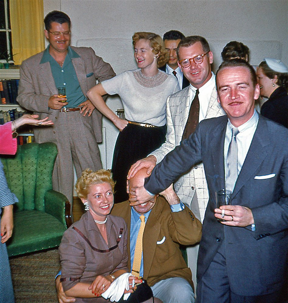 This was a party thrown for my mom and dad who are somewhat lost in the background, behind the cut-ups in front. At the house of a friend in South Pasadena, 1954. This is one-half of a 3D photo card. View full size.